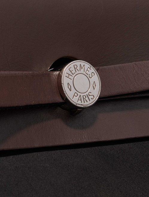 Pre-owned Hermès bag Herbag 39 Toile / Vache Hunter Black / Chocolate Black, Brown Logo | Sell your designer bag on Saclab.com