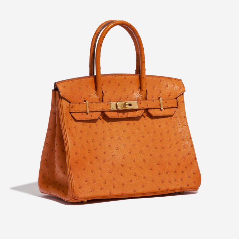 Pre-owned Hermès bag Birkin 30 Ostrich leather Orange Orange Side Front | Sell your designer bag on Saclab.com