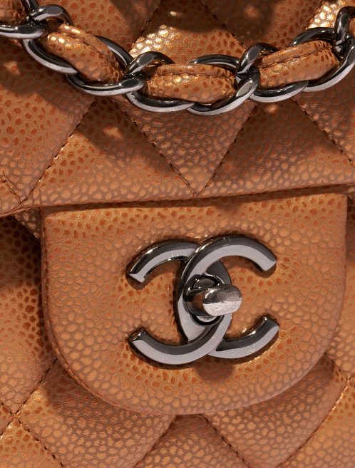 Pre-owned Chanel bag Timeless Jumbo Caviar Copper Gold, Orange Closing System | Sell your designer bag on Saclab.com