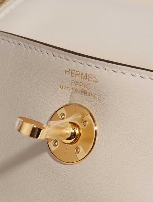 Pre-owned Hermès bag Lindy Mini Swift Nata Beige, White Logo | Sell your designer bag on Saclab.com