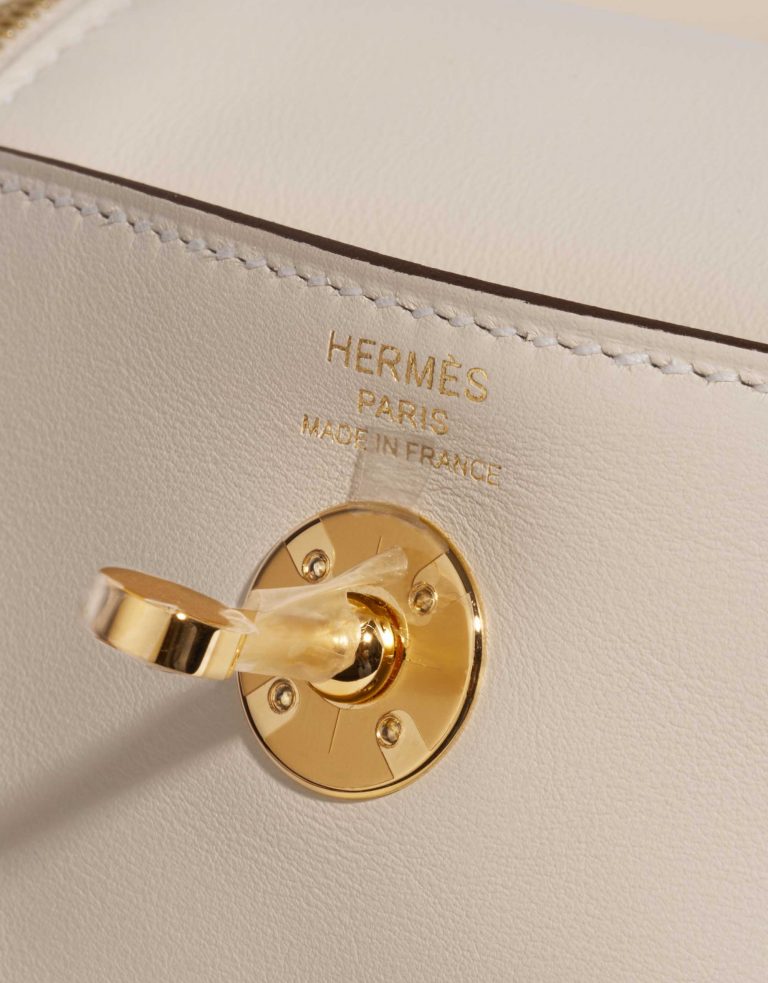 Pre-owned Hermès bag Lindy Mini Swift Nata Beige, White Logo | Sell your designer bag on Saclab.com