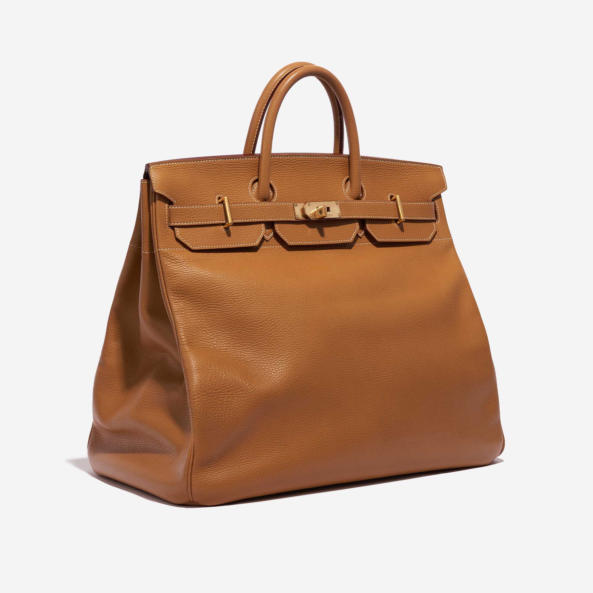 Pre-owned Hermès bag Haut à Courroies 45 Vache Ardennes Gold Brown Side Front | Sell your designer bag on Saclab.com