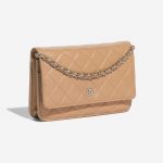 Pre-owned Chanel bag WOC Lamb Beige Beige Side Front | Sell your designer bag on Saclab.com
