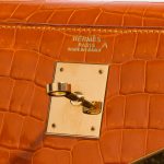 Pre-owned Hermès bag Kelly 32 Porosus Crocodile Pain d’epice Orange Logo | Sell your designer bag on Saclab.com