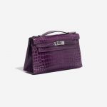 Pre-owned Hermès bag Kelly Pochette Alligator Amethyst Violet Side Front | Sell your designer bag on Saclab.com