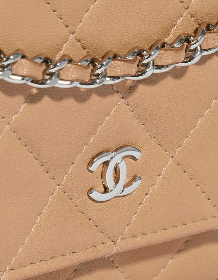 Pre-owned Chanel bag WOC Lamb Beige Beige Front | Sell your designer bag on Saclab.com