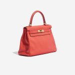 Pre-owned Hermès bag Kelly 28 Clemence Bougainvillier Red, Rose Side Front | Sell your designer bag on Saclab.com