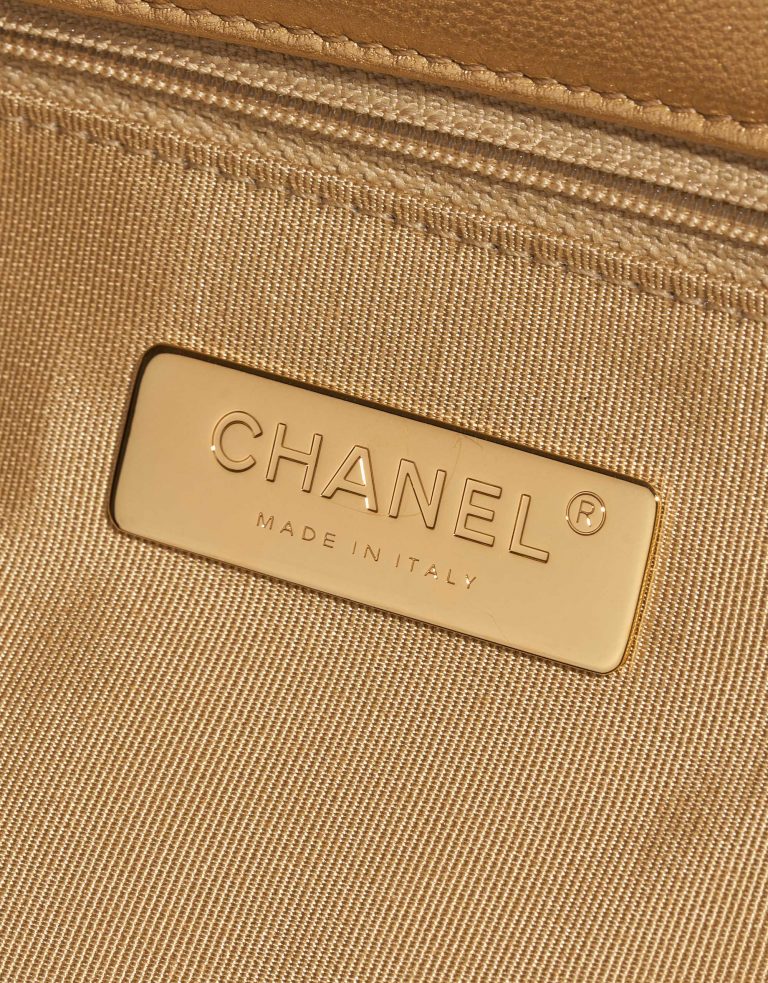 Pre-owned Chanel bag 19 Flap Bag Maxi Lamb Gold Gold Logo | Sell your designer bag on Saclab.com