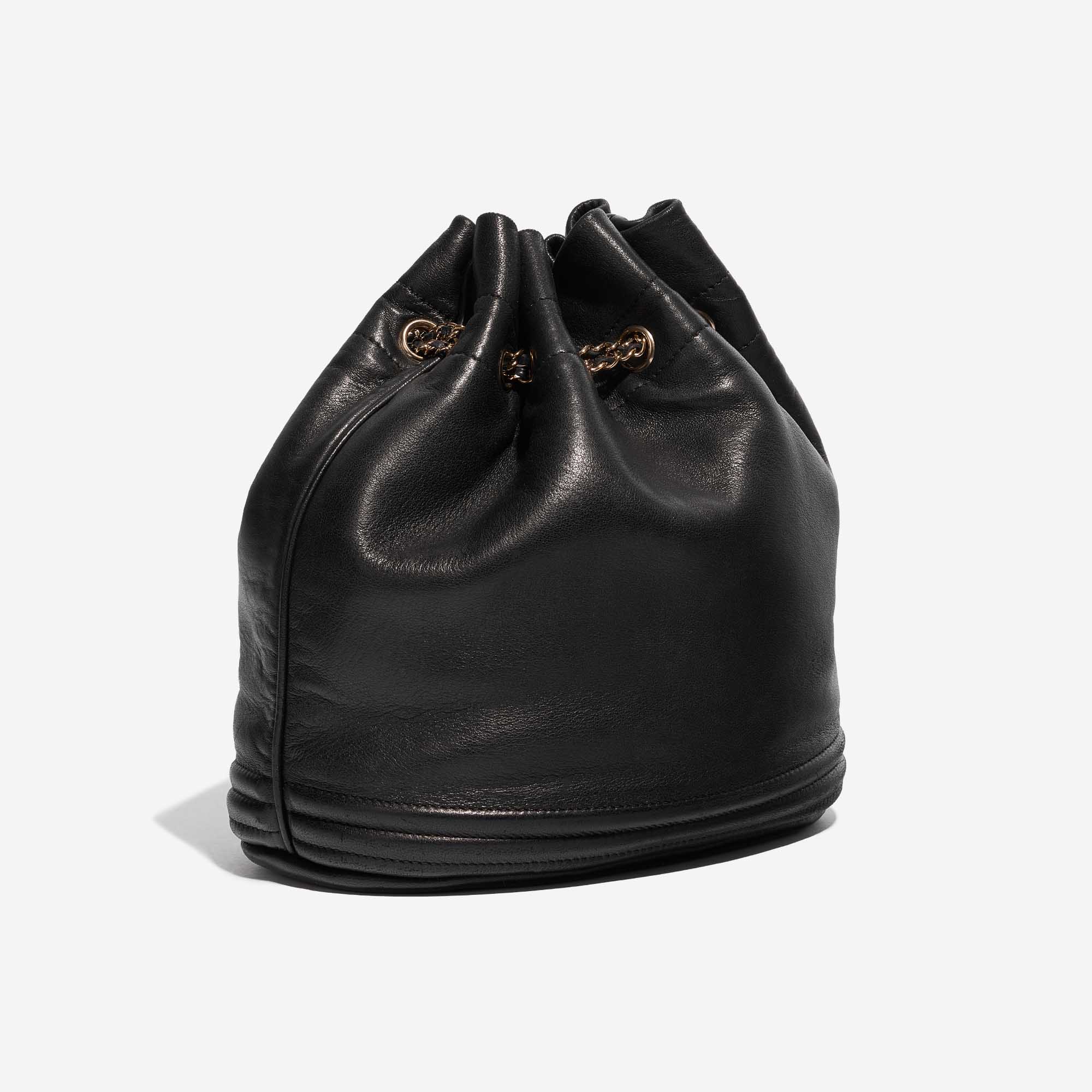 Pre-owned Chanel bag Drawstring Bucket Lamb Black Black Side Front | Sell your designer bag on Saclab.com