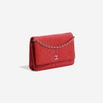 Pre-owned Chanel bag WOC Lamb Camellia Red Red Side Front | Sell your designer bag on Saclab.com