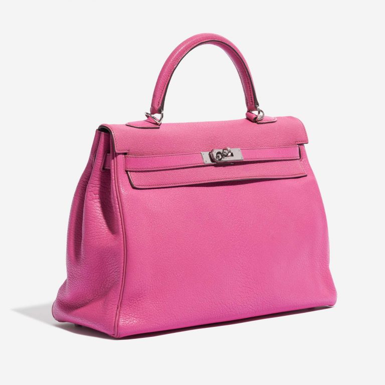 Pre-owned Hermès bag Kelly 35 Chèvre Mysore Rose Shocking Pink Side Front | Sell your designer bag on Saclab.com