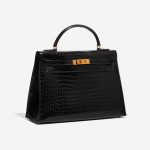 Pre-owned Hermès bag Kelly 32 Porosus Crocodile Black Black Side Front | Sell your designer bag on Saclab.com