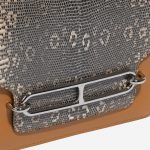 Pre-owned Hermès bag Roulis Mini Lizard Ombre Caramel Brown Closing System | Sell your designer bag on Saclab.com