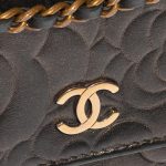 Pre-owned Chanel bag WOC Lamb Camellia Black / Shimmering Gold Black Closing System | Sell your designer bag on Saclab.com