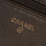 Chanel WOC Lamb Camellia Black / Shimmering Gold Black Logo | Sell your designer bag on Saclab.com