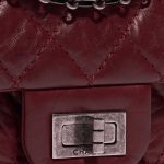 Chanel 2.55 Reissue 224 Lamb Dark Red Burgundy, Red Closing System | Sell your designer bag on Saclab.com