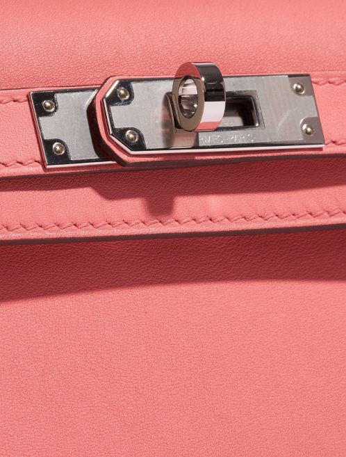 Sac d'occasion Hermès Kelly Cut Clutch Swift Rose d'Été Rose Closing System | Vendez votre sac de créateur sur Saclab.com