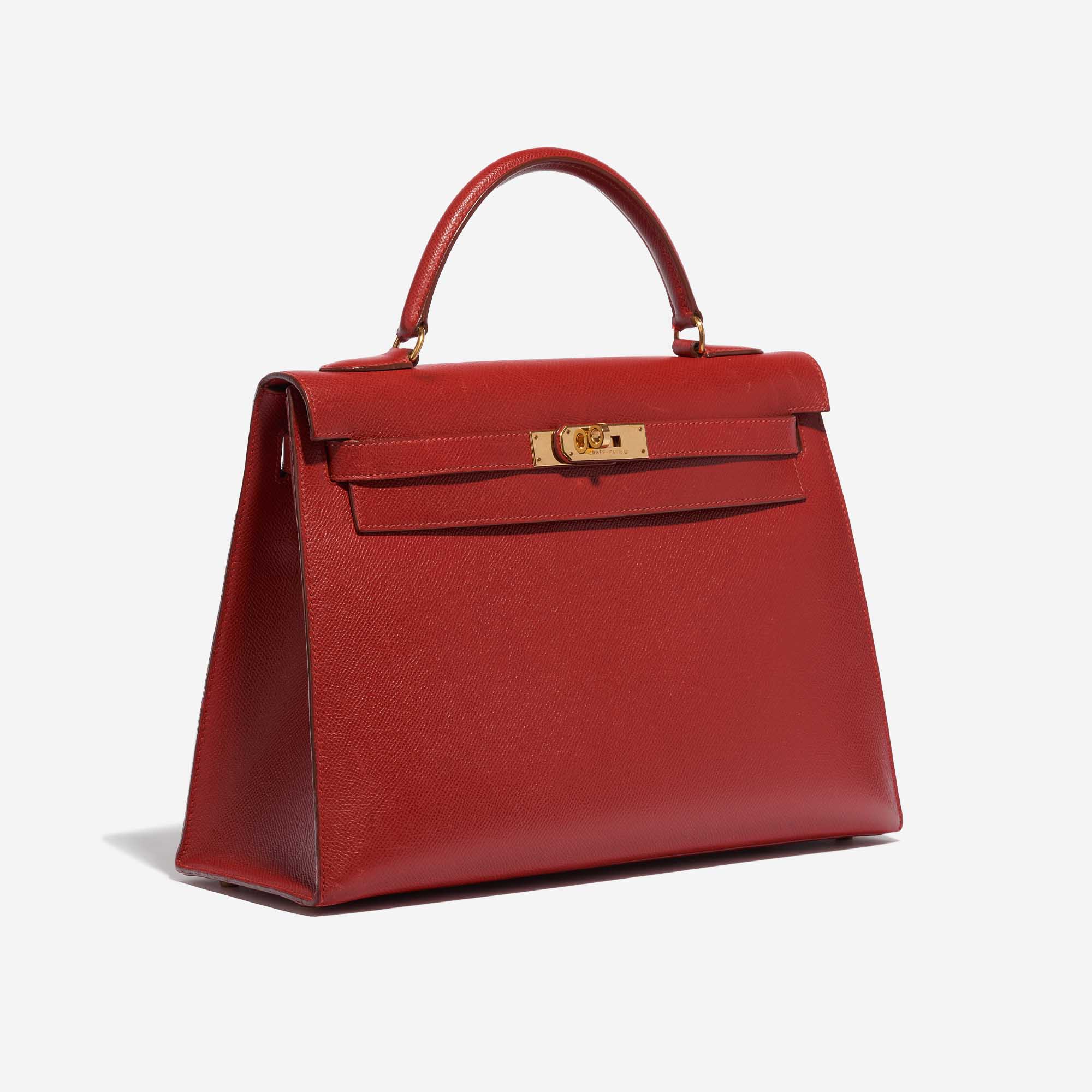 Pre-owned Hermès bag Kelly 32 Epsom Rouge Casaque Red Side Front | Sell your designer bag on Saclab.com