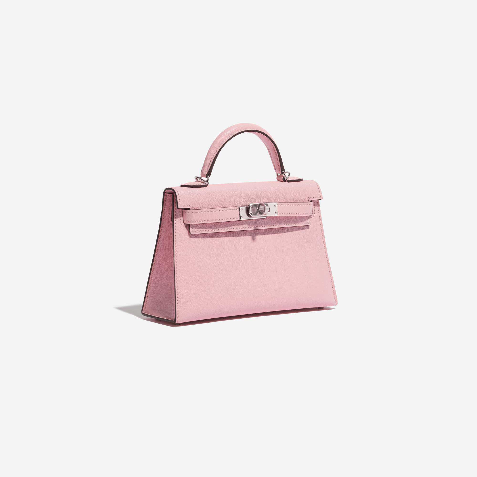 Gebrauchte Hermès Tasche Kelly Mini Chèvre Mysore Rose Sakura Rose Side Front | Verkaufen Sie Ihre Designer-Tasche auf Saclab.com