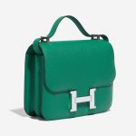 Pre-owned Hermès bag Constance 24 Epsom Vert Jade / Blue Brume Green Side Front | Sell your designer bag on Saclab.com