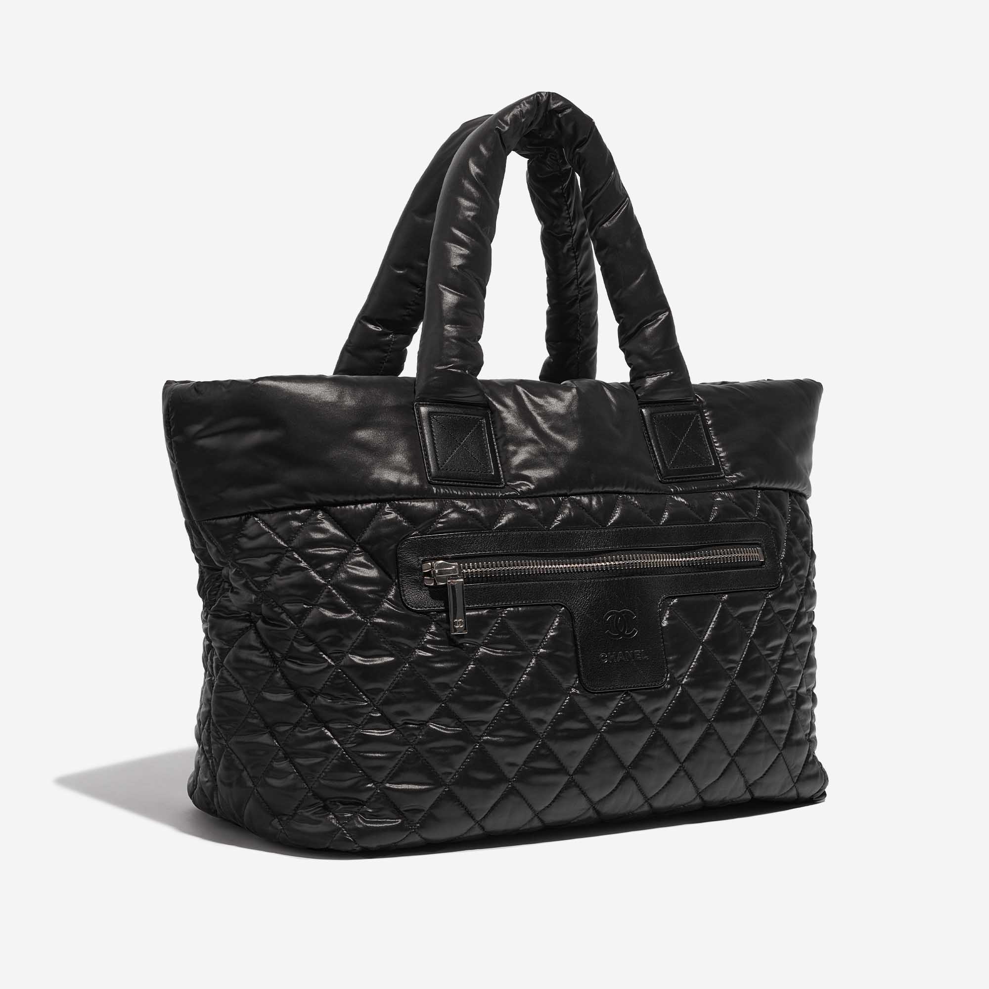 Pre-owned Chanel bag Cocoon Shopper Synthetic Black Black Side Front | Sell your designer bag on Saclab.com