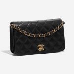 Pre-owned Chanel bag Timeless WOC Lamb Black Black Side Front | Sell your designer bag on Saclab.com