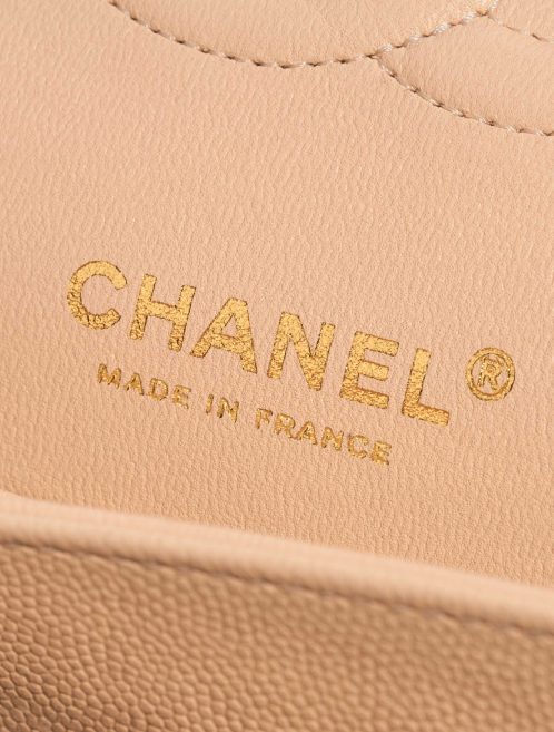 Pre-owned Chanel bag Timeless Medium Caviar Nude Beige Logo | Sell your designer bag on Saclab.com