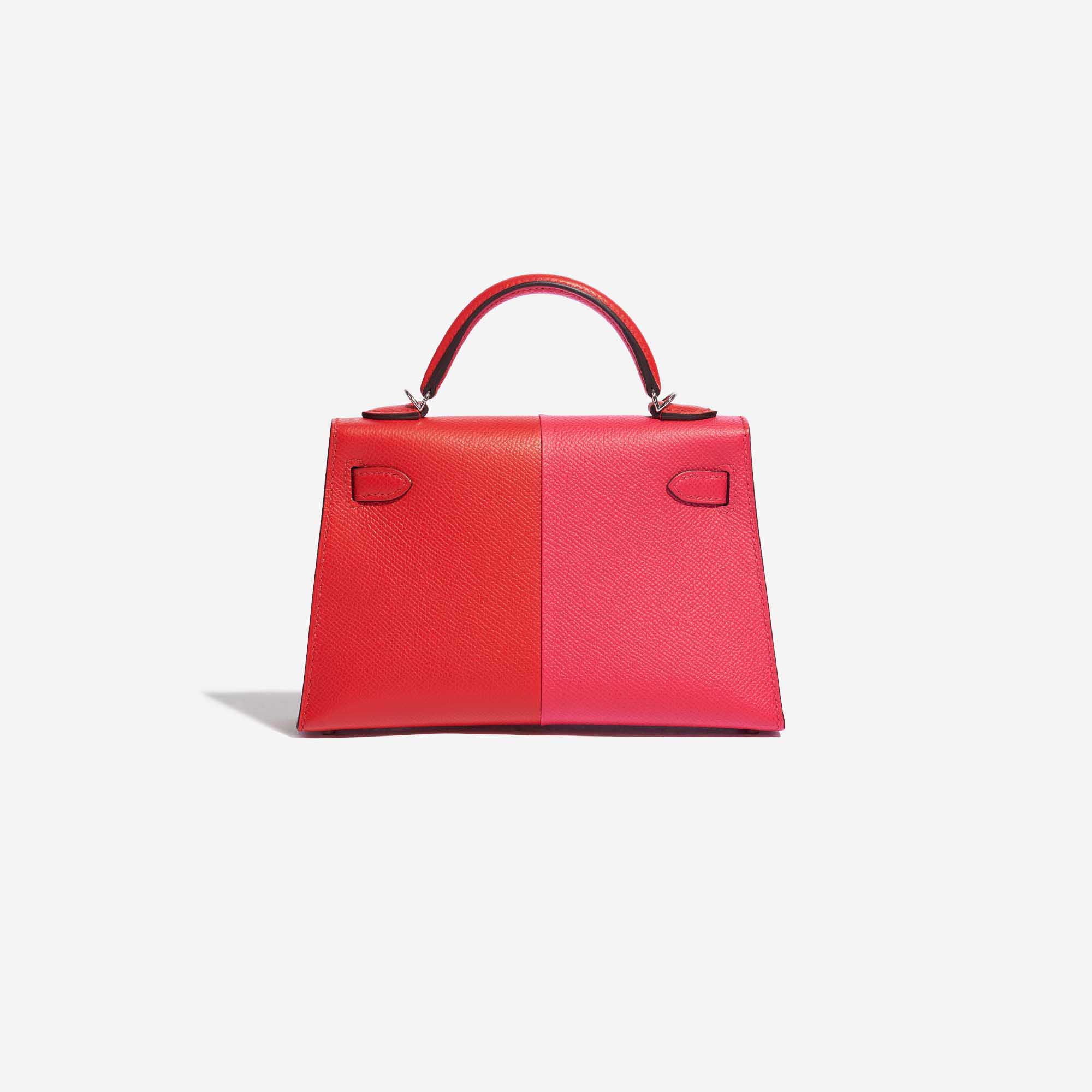 Pre-owned Hermès bag Kelly Mini Epsom Rose Extreme / Rouge de Coeur / Blue Zanzibar Red, Rose Back | Sell your designer bag on Saclab.com