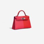 Pre-owned Hermès bag Kelly Mini Epsom Rose Extreme / Rouge de Coeur / Blue Zanzibar Red, Rose Side Front | Sell your designer bag on Saclab.com