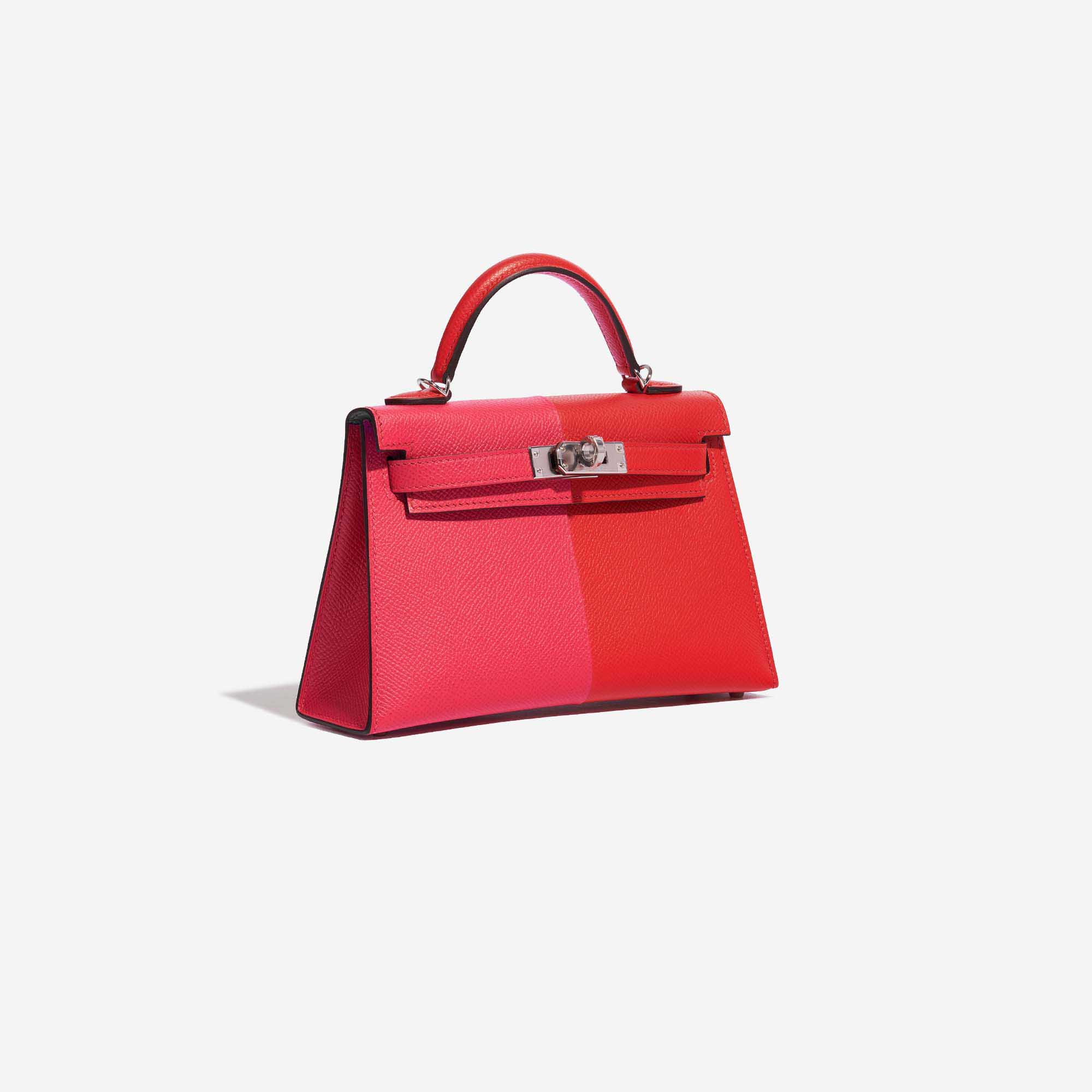 Gebrauchte Hermès Tasche Kelly Mini Epsom Rose Extreme / Rouge de Coeur / Blue Zanzibar Red, Rose Side Front | Verkaufen Sie Ihre Designer-Tasche auf Saclab.com