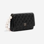 Pre-owned Chanel bag Timeless WOC Lambskin Black Big Pearls Black Side Front | Sell your designer bag on Saclab.com
