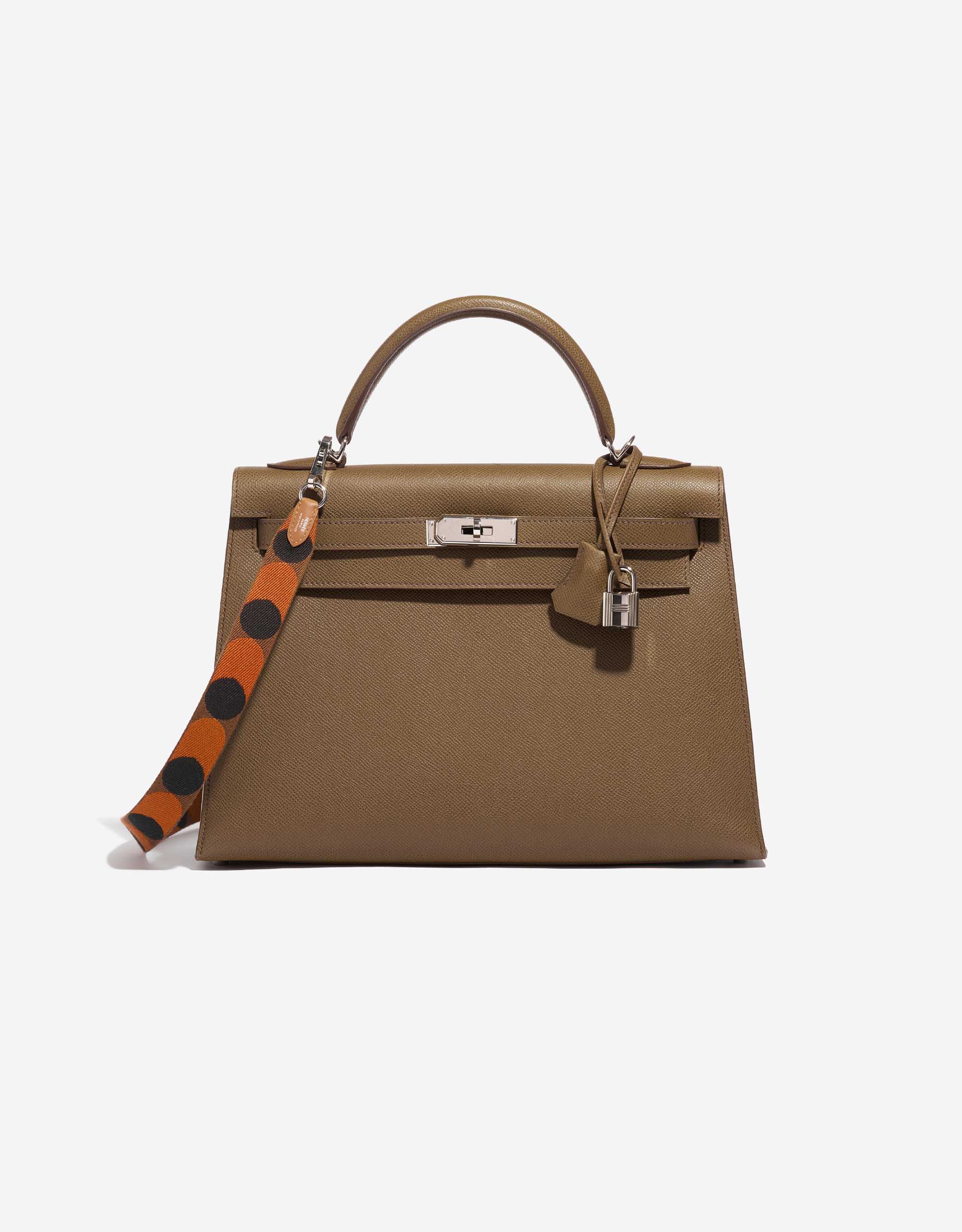 Saclab-Official on X: Hermès Kelly Pochette Lizard- making every outfit  classier since 2006. #Saclab #Hermes #KellyPochette #ChicToBeGreen  #PreownedLuxury  / X