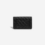 Pre-owned Chanel bag 2.55 Reissue WOC Lambskin Black Black Back | Sell your designer bag on Saclab.com