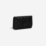 Pre-owned Chanel bag 2.55 Reissue WOC Lambskin Black Black Side Front | Sell your designer bag on Saclab.com