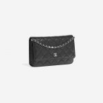 Pre-owned Chanel bag Timeless WOC Caviar Black Black Side Front | Sell your designer bag on Saclab.com