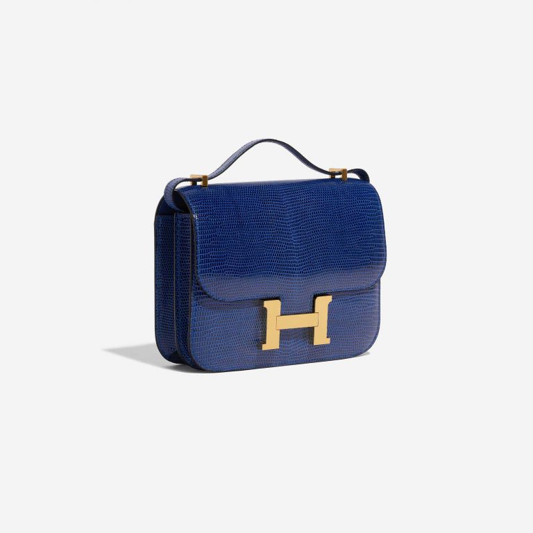 Pre-owned Hermès bag Constance 18 Salvator Lizard Blue Sapphire Blue Side Front | Sell your designer bag on Saclab.com