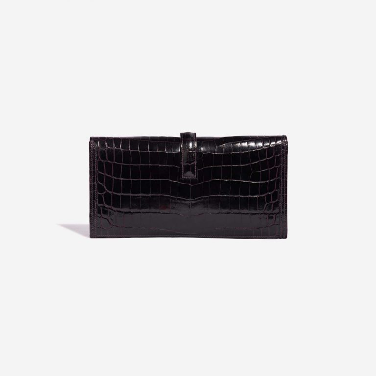 Pre-owned Hermès bag Jige Clutch Shiny Niloticus Crocodile Prunoir Violet Back | Sell your designer bag on Saclab.com