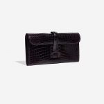 Pre-owned Hermès bag Jige Clutch Shiny Niloticus Crocodile Prunoir Violet Side Front | Sell your designer bag on Saclab.com