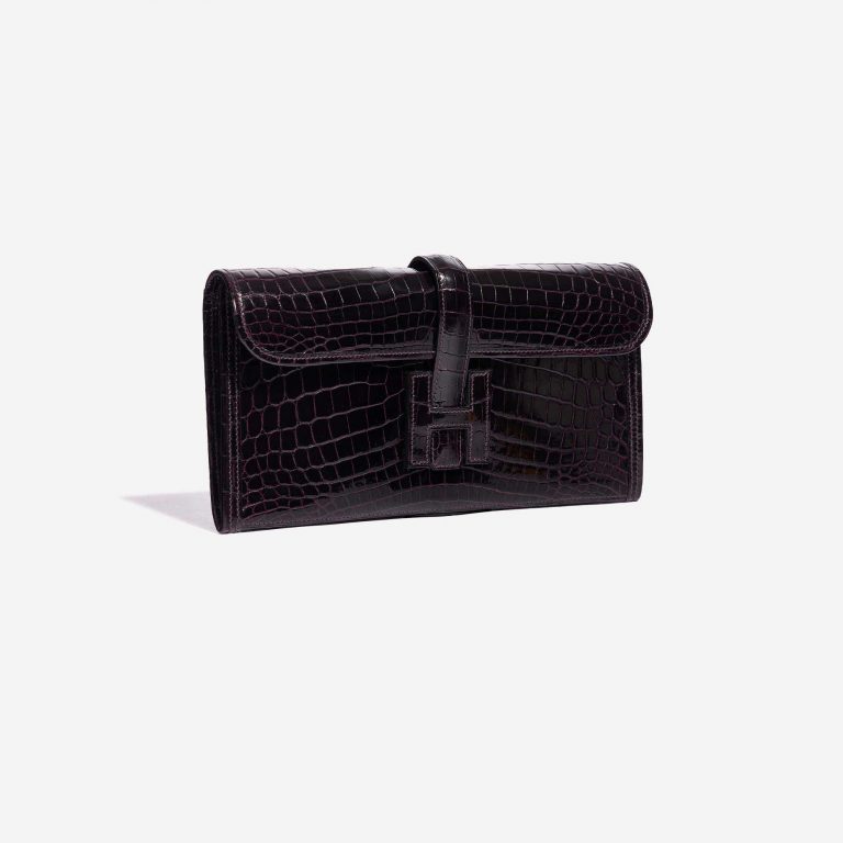 Pre-owned Hermès bag Jige Clutch Shiny Niloticus Crocodile Prunoir Violet Side Front | Sell your designer bag on Saclab.com