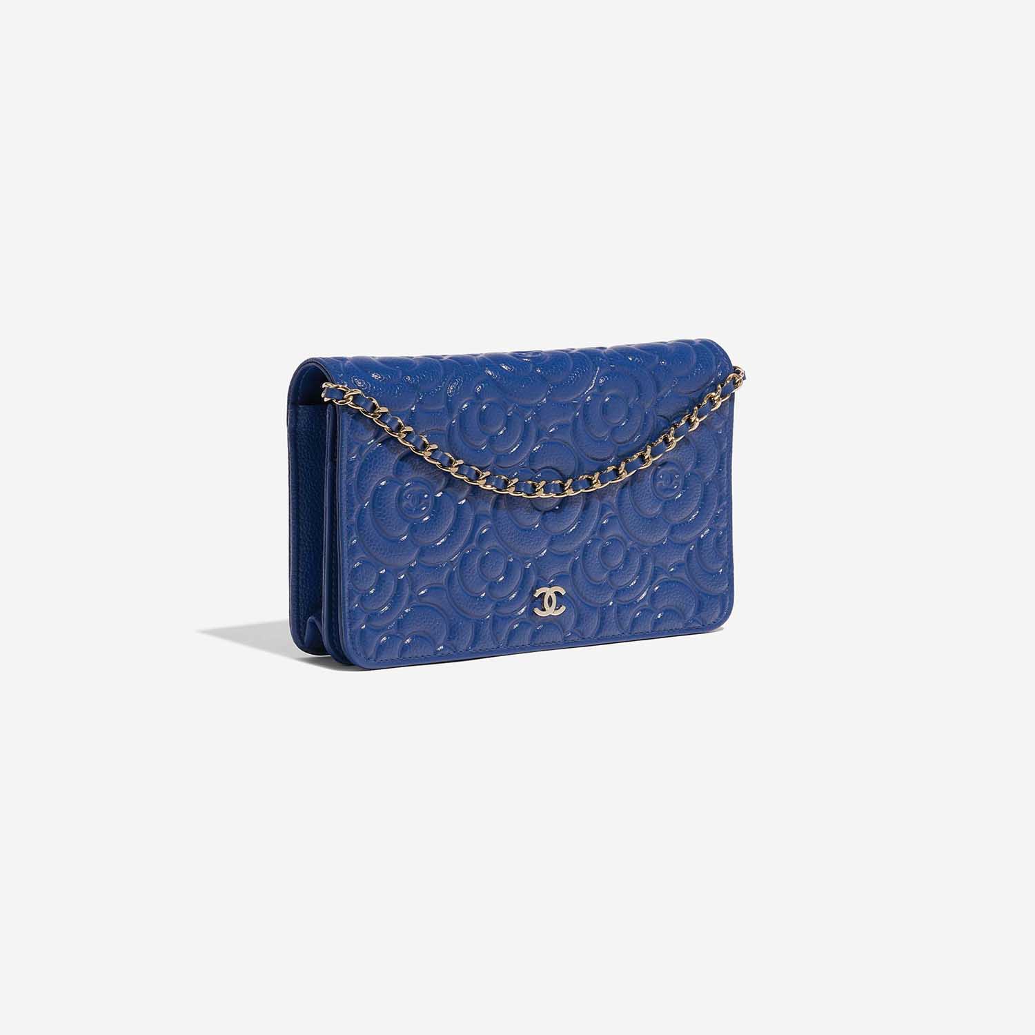 Pre-owned Chanel bag WOC Camellia Lamb Blue Blue Side Front | Sell your designer bag on Saclab.com