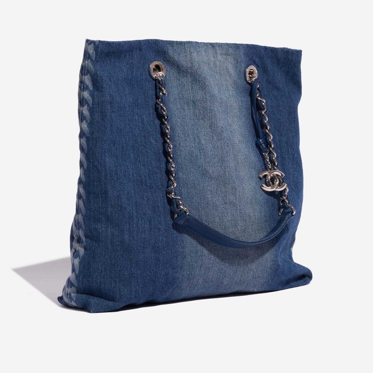 Pre-owned Chanel bag Shopping Tote Denim Blue Blue Side Front | Sell your designer bag on Saclab.com