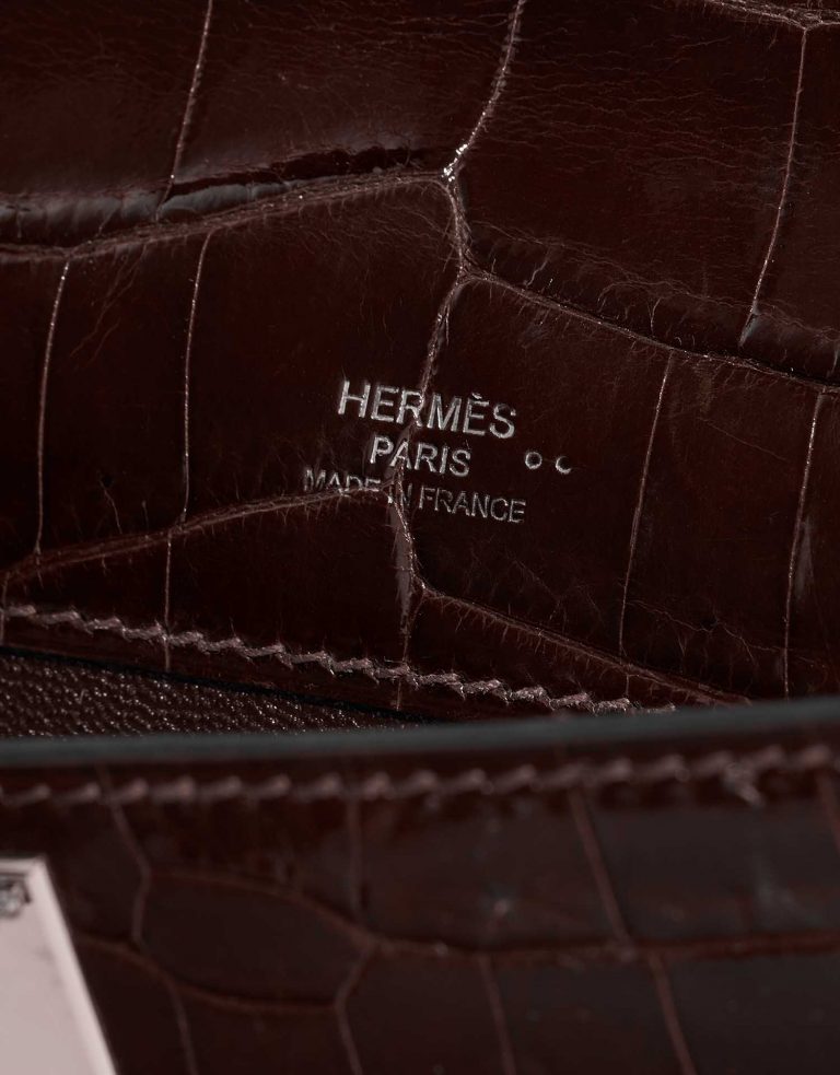 Pre-owned Hermès bag Kelly Cut Clutch Niloticus Crocodile Chocolat Brown Logo | Sell your designer bag on Saclab.com