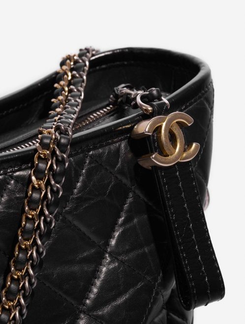 Pre-owned Chanel bag Gabrielle Large Calf Black Black Closing System | Sell your designer bag on Saclab.com
