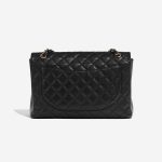Pre-owned Chanel bag Timeless Maxi Caviar Black Black Back | Sell your designer bag on Saclab.com