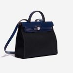 Pre-owned Hermès bag Herbag 31 Vache Hunter / Toile Militaire Noir / Bleu Saphir Black, Blue Side Front | Sell your designer bag on Saclab.com