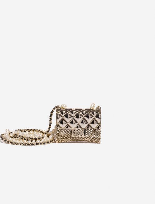 Pre-owned Chanel bag Timeless Micro Metal Gold Tone Gold Front | Sell your designer bag on Saclab.com