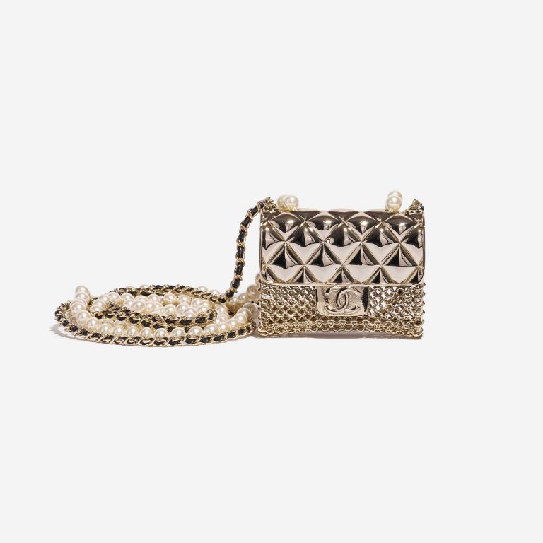 Pre-owned Chanel bag Timeless Micro Metal Gold Tone Gold Front | Sell your designer bag on Saclab.com