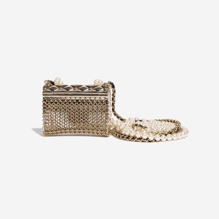 Pre-owned Chanel bag Timeless Micro Metal Gold Tone Gold Back | Sell your designer bag on Saclab.com