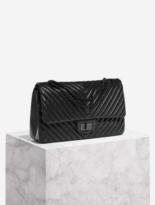 Pre-owned Chanel bag 2.55 Reissue 227 Aged Calf SO Black Black Side Front | Sell your designer bag on Saclab.com