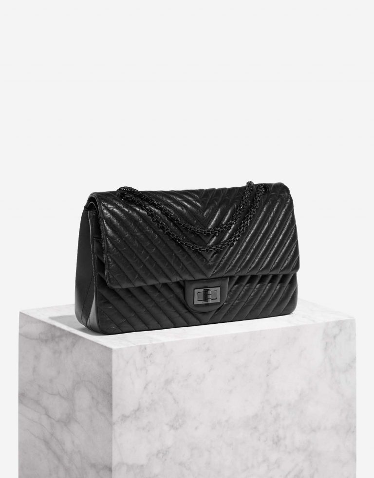 Pre-owned Chanel bag 2.55 Reissue 227 Aged Calf SO Black Black Side Front | Sell your designer bag on Saclab.com